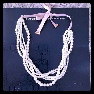 Pearl and tie ribbon necklace